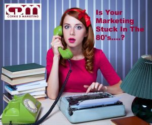 Corrie D Marketing Is Your Marketing Stuck In The 80s Girl On Typewriter and circular dial traditional style telephone